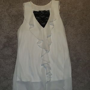 A white and black dressy tank.